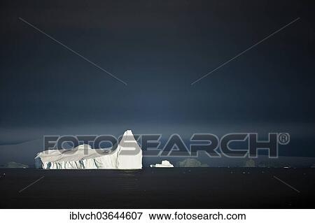 "Icebergs, storm clouds in the morning light, Antarctic Peninsula, Antarctica" View Large Photo Image Stock Photo - "Icebergs, storm clouds in the morning light, Antarctic Peninsula, Antarctica". Fotosearch