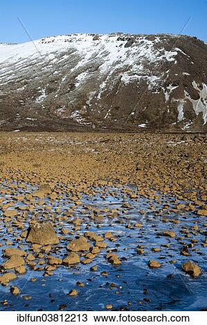 "Icelandic landscape, brown boulders and blue ice, Suournes or Southern Peninsula, Reykjanes Peninsula, Iceland, Europe" View Large Photo Image Stock Image - "Icelandic landscape, brown boulders and blue ice, Suournes or Southern Peninsula, Reykjanes Peninsula, Iceland, Europe". Fotosearch