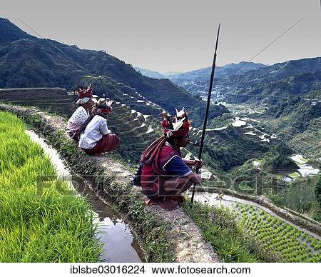 "Ifugao people, members of an ethnic group wearing traditional costumes, Banaue Rice Terraces, also known as musuan peak, Banaue, Ifugao, Luzon, Philippines, Asia" View Large Photo Image Picture - "Ifugao people, members of an ethnic group wearing traditional costumes, Banaue Rice Terraces, also known as musuan peak, Banaue, Ifugao, Luzon, Philippines, Asia". Fotosearch