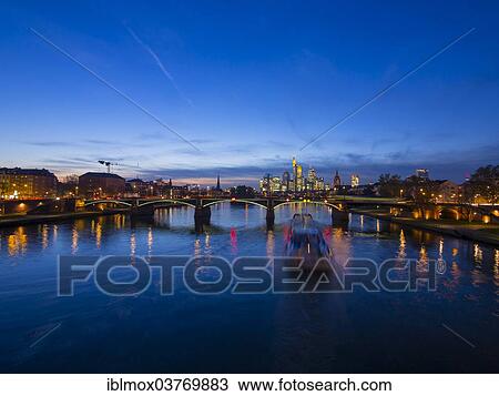 "Ignatz-Bubis-Brucke bridge, behind the skyline of Frankfurt, Frankfurt am Main, Hesse, Germany, Europe" View Large Photo Image Stock Image - "Ignatz-Bubis-Brucke bridge, behind the skyline of Frankfurt, Frankfurt am Main, Hesse, Germany, Europe". Fotosearch