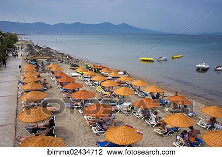 Stock Image - "Ilica Mevkii Long Beach, Sogucak, tourists, Kusadasi, Turkish Riviera, Izmir Province, Turkey, Asia". Fotosearch