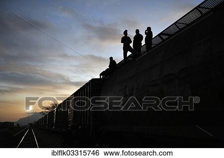 "Illegal immigrants from Latin America on their way to the U. S., trying to reach the U. S. border as stowaways on freight trains, Ixtepec, Oaxaca, Mexico, North America" View Large Photo Image Stock Photograph - "Illegal immigrants from Latin America on their way to the U. S., trying to reach the U. S. border as stowaways on freight trains, Ixtepec, Oaxaca, Mexico, North America". Fotosearch