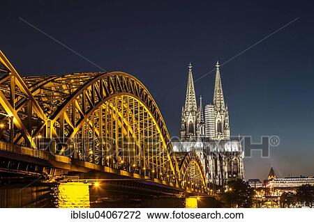 "Illuminated Cologne Cathedral, the Rhine and Hohenzollern Bridge at night, Cologne, North Rhine-Westphalia, Germany, Europe" View Large Photo Image Stock Image - "Illuminated Cologne Cathedral, the Rhine and Hohenzollern Bridge at night, Cologne, North Rhine-Westphalia, Germany, Europe". Fotosearch