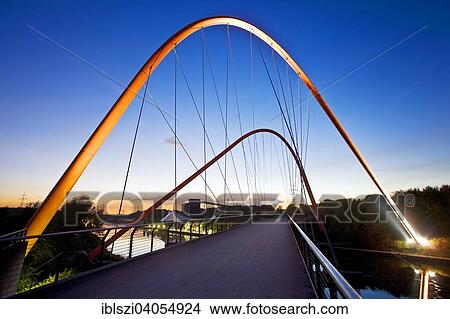"Illuminated double arch bridge over the Rhine-Herne Canal, Nordsternpark, former Nordstern colliery, Gelsenkirchen, North Rhine-Westphalia, Germany, Europe" View Large Photo Image Picture - "Illuminated double arch bridge over the Rhine-Herne Canal, Nordsternpark, former Nordstern colliery, Gelsenkirchen, North Rhine-Westphalia, Germany, Europe". Fotosearch