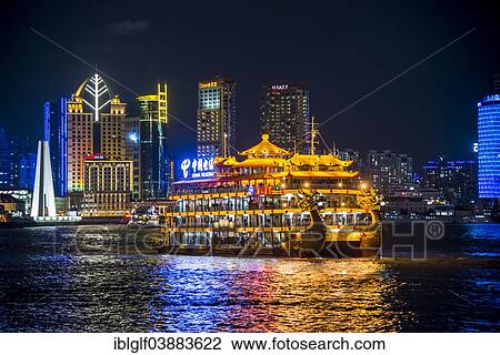 "Illuminated dragon boat, pleasure boat on Huangpo, from The Bund, Hyatt at The Bund at the back, at night, Shanghai, China, Asia" View Large Photo Image Stock Image - "Illuminated dragon boat, pleasure boat on Huangpo, from The Bund, Hyatt at The Bund at the back, at night, Shanghai, China, Asia". Fotosearch