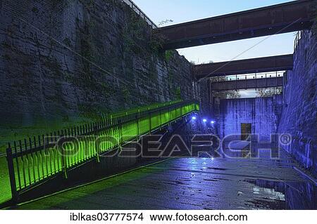 "Illuminated former coal bunkers, disused steelworks, Landscape Park Duisburg-Nord, Ruhr area, North Rhine-Westphalia, Germany, Europe" View Large Photo Image Picture - "Illuminated former coal bunkers, disused steelworks, Landscape Park Duisburg-Nord, Ruhr area, North Rhine-Westphalia, Germany, Europe". Fotosearch