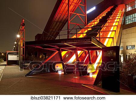 "Illuminated gangway to the Ruhr Museum at the Zeche Zollverein Coal Mine Shaft XII, Essen, Ruhr area, North Rhine-Westphalia, Germany, Europe" View Large Photo Image Stock Image - "Illuminated gangway to the Ruhr Museum at the Zeche Zollverein Coal Mine Shaft XII, Essen, Ruhr area, North Rhine-Westphalia, Germany, Europe". Fotosearch