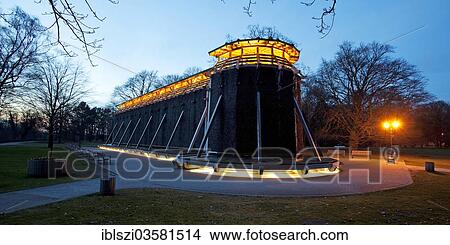 "Illuminated graduation tower in the Kurpark park at dusk, Hamm, North Rhine-Westphalia, Germany, Europe" View Large Photo Image Picture - "Illuminated graduation tower in the Kurpark park at dusk, Hamm, North Rhine-Westphalia, Germany, Europe". Fotosearch
