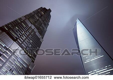 Stock Image - "Illuminated Jin Mao Tower and Shanghai World Financial Center at night, SWFC Building, Shanghai, China, Asia". Fotosearch