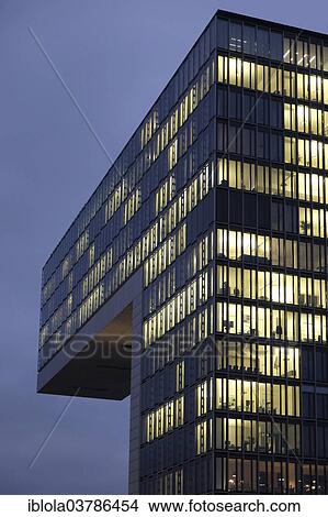 "Illuminated Kranhaus Sud office building at dusk, Rheinauhafen, Cologne, North Rhine-Westphalia, Germany, Europe" View Large Photo Image Picture - "Illuminated Kranhaus Sud office building at dusk, Rheinauhafen, Cologne, North Rhine-Westphalia, Germany, Europe". Fotosearch
