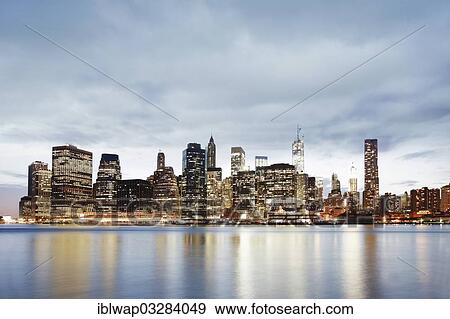 "Illuminated Manhattan skyline at night, East River, Manhattan, New York City, New York, United States, North America" View Large Photo Image Stock Photo - "Illuminated Manhattan skyline at night, East River, Manhattan, New York City, New York, United States, North America". Fotosearch