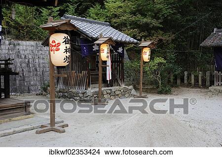 Picture - "Illuminated paper lanterns in a Shinto shrine, Iwakura, near Kyoto, Kyoto, Japan, East Asia, Asia". Fotosearch