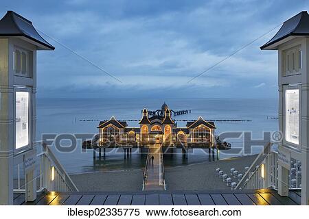 "Illuminated pier at the Baltic Sea resort of Sellin, Baltic Seaside Resort Sellin, Rugen, Mecklenburg-Western Pomerania, Germany, Europe" View Large Photo Image Stock Photography - "Illuminated pier at the Baltic Sea resort of Sellin, Baltic Seaside Resort Sellin, Rugen, Mecklenburg-Western Pomerania, Germany, Europe". Fotosearch