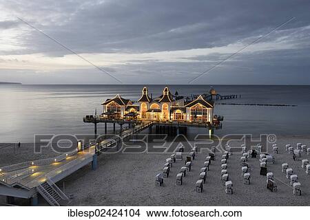 Illuminated pier, Baltic Sea resort town of Sellin, Ruegen Island, Mecklenburg-Western Pomerania, Germany, Europe View Large Photo Image Picture - Illuminated pier, Baltic Sea resort town of Sellin, Ruegen Island, Mecklenburg-Western Pomerania, Germany, Europe. Fotosearch
