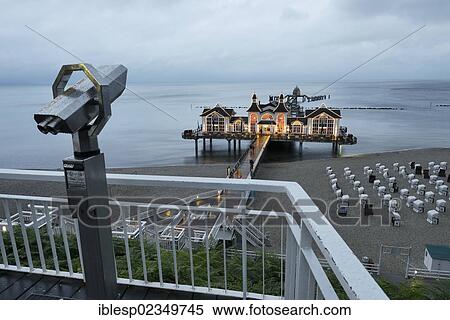 "Illuminated pier, telescope, Baltic Sea resort town of Sellin, Baltic Seaside Resort Sellin, Rugen, Mecklenburg-Western Pomerania, Germany, Europe" View Large Photo Image Stock Photography - "Illuminated pier, telescope, Baltic Sea resort town of Sellin, Baltic Seaside Resort Sellin, Rugen, Mecklenburg-Western Pomerania, Germany, Europe". Fotosearch