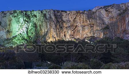 Stock Image - "Illuminated rock for climbers at the El Bahira camping site, San Vito lo Capo, Nordwest- Kuste, Provinz Trapani, Sicily, Italy, Europe". Fotosearch