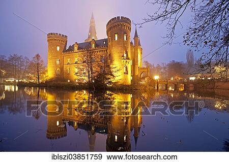 "Illuminated Schloss Moyland Castle, moated castle, Museum of Modern Art, near Bedburg-Hau, North Rhine-Westphalia, Germany, Europe" View Large Photo Image Stock Photo - "Illuminated Schloss Moyland Castle, moated castle, Museum of Modern Art, near Bedburg-Hau, North Rhine-Westphalia, Germany, Europe". Fotosearch