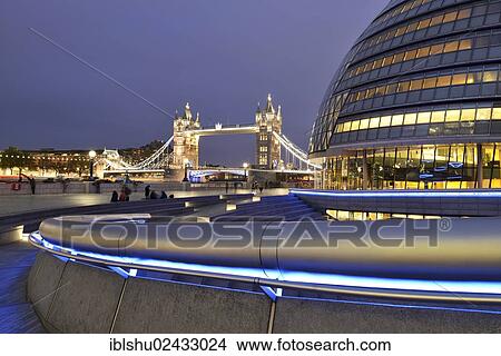 "Illuminated Tower Bridge, City Hall, right, designed by Norman Foster, at dusk, London, England, United Kingdom, Europe" View Large Photo Image Picture - "Illuminated Tower Bridge, City Hall, right, designed by Norman Foster, at dusk, London, England, United Kingdom, Europe". Fotosearch