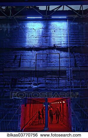 Stock Photograph - "Illuminated tunnel, former coal bunkers, disused steelworks, Landscape Park Duisburg-Nord, Ruhr area, North Rhine-Westphalia, Germany, Europe". Fotosearch