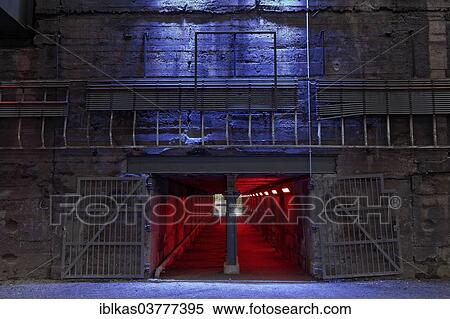 Stock Photography - "Illuminated tunnel, former coal bunkers, disused steelworks, Landscape Park Duisburg-Nord, Ruhr area, North Rhine-Westphalia, Germany, Europe". Fotosearch