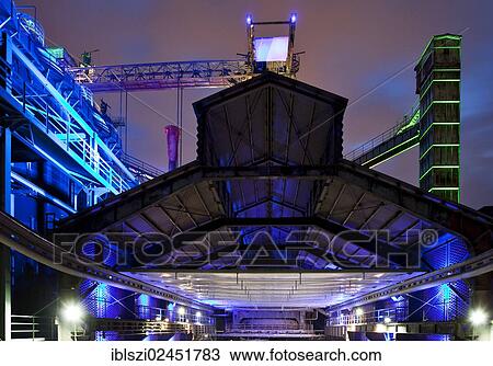 "Illuminated view of the former steel plant in Landschaftspark Duisburg Nord, North Rhine-Westphalia, Germany, Europe, PublicGround, Europe" View Large Photo Image Stock Image - "Illuminated view of the former steel plant in Landschaftspark Duisburg Nord, North Rhine-Westphalia, Germany, Europe, PublicGround, Europe". Fotosearch