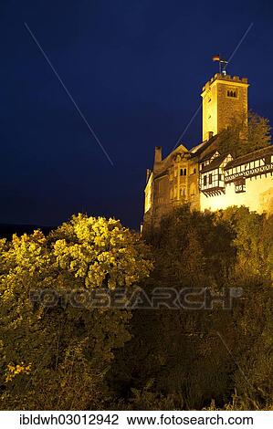 Stock Image - "Illuminated Wartburg Castle, UNESCO World Heritage Site, night scene, Eisenach, Thuringia, Germany, Europe". Fotosearch