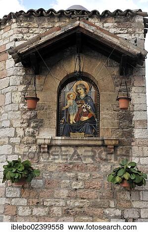 "Image of the Madonna, St Mary with Child, on a wall, historic town centre of Assisi, Italy, Europe" View Large Photo Image Stock Photo - "Image of the Madonna, St Mary with Child, on a wall, historic town centre of Assisi, Italy, Europe". Fotosearch