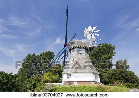 Stock Photo - "Immanuel Windmill, typical Dutch-style smock windmill, Kronprinzenkoog, Schleswig-Holstein, Germany, Europe". Fotosearch