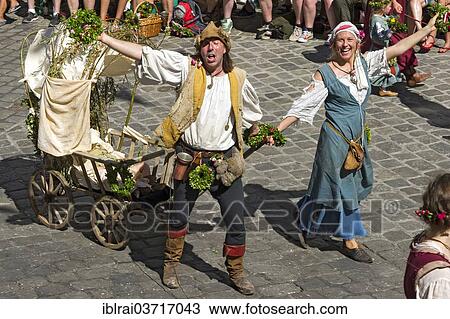 "Impoverished couple pulling a baby carriage, wedding procession of the """"Landshut Wedding"""", historic center, Landshut, Lower Bavaria, Bavaria, Germany, Europe" View Large Photo Image Stock Image - "Impoverished couple pulling a baby carriage, wedding procession of the """"Landshut Wedding"""", historic center, Landshut, Lower Bavaria, Bavaria, Germany, Europe". Fotosearch