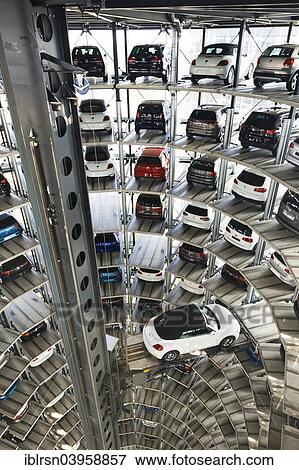 "In one of the two car towers, Autostadt of the Volkswagen AG, Wolfsburg, Lower Saxony, Germany, Europe" View Large Photo Image Stock Photo - "In one of the two car towers, Autostadt of the Volkswagen AG, Wolfsburg, Lower Saxony, Germany, Europe". Fotosearch