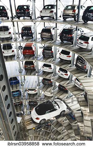 "In one of the two car towers, Autostadt of the Volkswagen AG, Wolfsburg, Lower Saxony, Germany, Europe" View Large Photo Image Stock Photo - "In one of the two car towers, Autostadt of the Volkswagen AG, Wolfsburg, Lower Saxony, Germany, Europe". Fotosearch