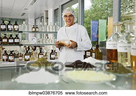 "In the laboratory for homeopathic dilutions or potentiation of an anthroposophic pharmaceutical company, liquids and powders are potentiated or diluted in a certain rhythm by the chief technician" View Large Photo Image Stock Photography - "In the laboratory for homeopathic dilutions or potentiation of an anthroposophic pharmaceutical company, liquids and powders are potentiated or diluted in a certain rhythm by the chief technician". Fotosearch