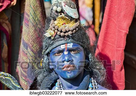 "Indian boy, about 11 years, transformed with blue makeup into the Hindu God Shiva at a Hindu festival, Pushkar, Rajasthan, India, Asia" View Large Photo Image Stock Photo - "Indian boy, about 11 years, transformed with blue makeup into the Hindu God Shiva at a Hindu festival, Pushkar, Rajasthan, India, Asia". Fotosearch