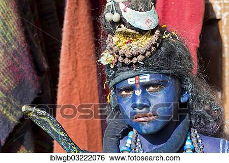 "Indian boy, about 11 years, transformed with blue makeup into the Hindu God Shiva at a Hindu festival, Pushkar, Rajasthan, India, Asia" View Large Photo Image Stock Photograph - "Indian boy, about 11 years, transformed with blue makeup into the Hindu God Shiva at a Hindu festival, Pushkar, Rajasthan, India, Asia". Fotosearch