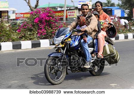 "Indian family on a motorcycle in Mumbai, Maharashtra, India, Asia" View Large Photo Image Stock Photo - "Indian family on a motorcycle in Mumbai, Maharashtra, India, Asia". Fotosearch