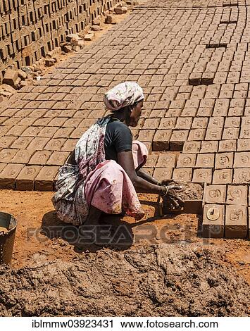 "Indian woman producing adobe bricks, Usilampatti, Tamil Nadu, India, Asia" View Large Photo Image Stock Image - "Indian woman producing adobe bricks, Usilampatti, Tamil Nadu, India, Asia". Fotosearch