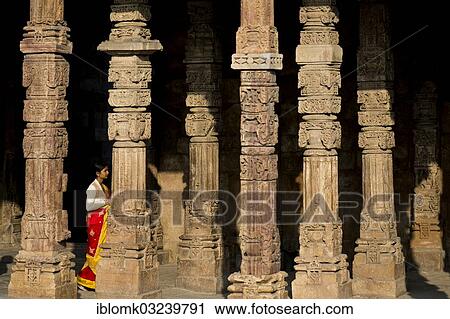 "Indian woman walking in between ornately carved stone pillars, Qutb complex, UNESCO World Heritage Site, Mehrauli Archaeological Park, New Delhi, Delhi, India, Asia" View Large Photo Image Stock Image - "Indian woman walking in between ornately carved stone pillars, Qutb complex, UNESCO World Heritage Site, Mehrauli Archaeological Park, New Delhi, Delhi, India, Asia". Fotosearch
