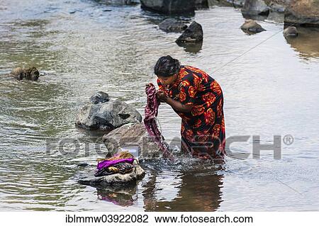 "Indian woman washing clothes in a river, Tamil Nadu, India, Asia" View Large Photo Image Stock Image - "Indian woman washing clothes in a river, Tamil Nadu, India, Asia". Fotosearch