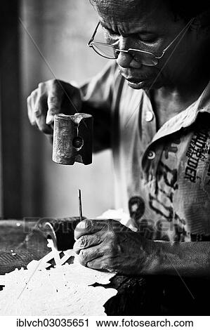 Stock Image - "Indonesian craftsman, Bali, Indonesia, Asia". Fotosearch