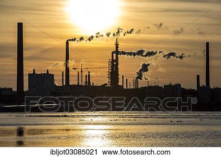 "Industrial plant of Sachtleben Chemie GmbH, a manufacturer of specialty chemicals, on the Rhine River at sunset, Homberg, Duisburg, North Rhine-Westphalia, Germany, Europe" View Large Photo Image Stock Image - "Industrial plant of Sachtleben Chemie GmbH, a manufacturer of specialty chemicals, on the Rhine River at sunset, Homberg, Duisburg, North Rhine-Westphalia, Germany, Europe". Fotosearch
