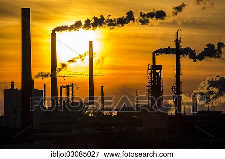 "Industrial plant of Sachtleben Chemie GmbH, a manufacturer of specialty chemicals, on the Rhine River at sunset, Homberg, Duisburg, North Rhine-Westphalia, Germany, Europe" View Large Photo Image Stock Photo - "Industrial plant of Sachtleben Chemie GmbH, a manufacturer of specialty chemicals, on the Rhine River at sunset, Homberg, Duisburg, North Rhine-Westphalia, Germany, Europe". Fotosearch