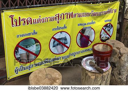 "Informative banner banning the wearing of light clothing in a temple, Chiang Rai, Chiang Rai province, Northern Thailand, Thailand, Asia" View Large Photo Image Stock Image - "Informative banner banning the wearing of light clothing in a temple, Chiang Rai, Chiang Rai province, Northern Thailand, Thailand, Asia". Fotosearch