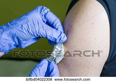 "Injection of medicine into an arm, Berlin, Germany, Europe" View Large Photo Image Stock Photo - "Injection of medicine into an arm, Berlin, Germany, Europe". Fotosearch