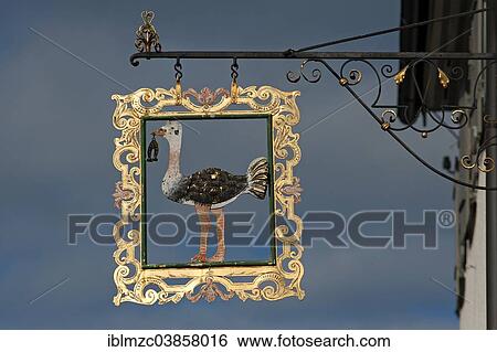 Stock Photograph - "Inn sign of the former """"Strauss"""" restaurant, the blacksmith's pub, the horseshoe was a sign of the iron processing trades, Wangen, Allgau, Bavaria, Germany, Europe". Fotosearch