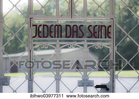 "Inscription in the gate """"Jedem das Seine"""" or """"to each their own"""", Buchenwald concentration camp, restored in 2014, Weimar, Thuringia, Germany, Europe" View Large Photo Image Stock Image - "Inscription in the gate """"Jedem das Seine"""" or """"to each their own"""", Buchenwald concentration camp, restored in 2014, Weimar, Thuringia, Germany, Europe". Fotosearch