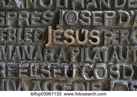 Stock Image - "Inscription """"Jesus"""" on the portal of the Passion facade of the Sagrada Familia, Holy Family Church of the Atonement, by architect Antoni Gaudi, UNESCO World Heritage Site, Barcelona,? Çï? ÇïCatalonia, Spain, Europe". Fotosearch