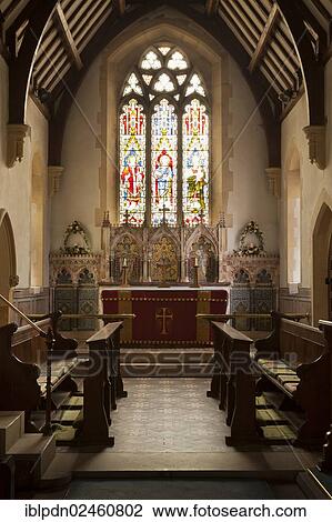 "Inside view of Holy Trinity Church, an English village church, looking up the nave towards the altar with a stained glass window, Horndean, Hampshire, United Kingdom, Europe" View Large Photo Image Stock Image - "Inside view of Holy Trinity Church, an English village church, looking up the nave towards the altar with a stained glass window, Horndean, Hampshire, United Kingdom, Europe". Fotosearch