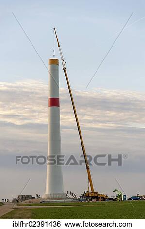 "Installation of a mast for a wind turbine, Grevenbroich, North Rhine-Westphalia, Germany, Europe" View Large Photo Image Stock Photograph - "Installation of a mast for a wind turbine, Grevenbroich, North Rhine-Westphalia, Germany, Europe". Fotosearch