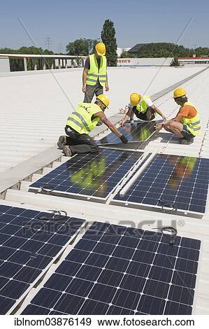 "Installation of a solar system on a commercial building, Berlin, Germany, Europe" View Large Photo Image Stock Photo - "Installation of a solar system on a commercial building, Berlin, Germany, Europe". Fotosearch