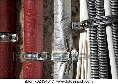 "Insulated heating pipes, cable harnesses, renovation of an old building, Stuttgart, Baden-Wuerttemberg, Germany, Europe" View Large Photo Image Stock Photo - "Insulated heating pipes, cable harnesses, renovation of an old building, Stuttgart, Baden-Wuerttemberg, Germany, Europe". Fotosearch